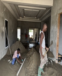 ouvriers-chape-beton-interieur-batiment